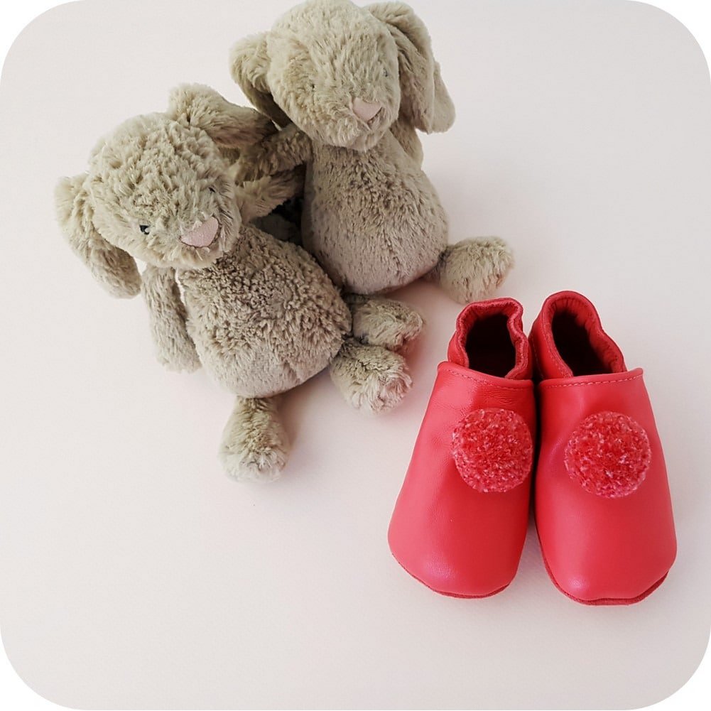FUCHSIA Babyhausschuhe mit Pompons